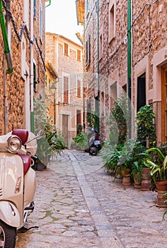 Romantic street alley at old village Fornalutx on Majorca island, Spain