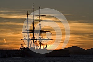 Romantic Sunset with boat sillouette photo