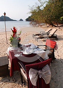 Romantic sunset dinner on beach