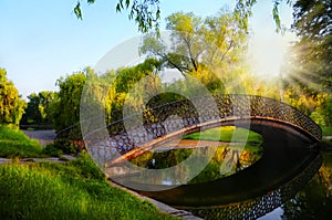 Romantic sunset moment on bridge in Park