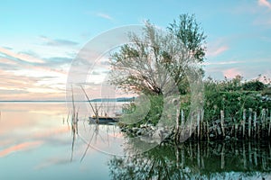 Romantic sunset on the trasimeno lake, umbria