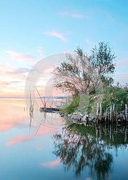 Romantic sunset on the trasimeno lake, umbria