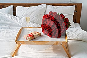 Romantic surprise on Valentine Day in bed