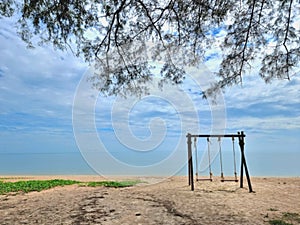 Romantic swings in Samila beach Thailand watching in the morning