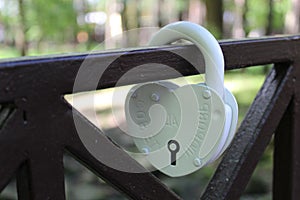 Romantic symbol of love door lock on the fence