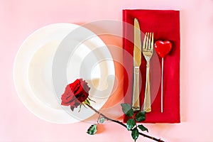 Romantic table setting for Valentines day or dinner date celebration wedding.