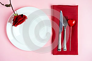 Romantic table setting for Valentines day or dinner date celebration wedding.