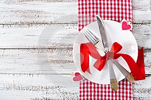 Romantic table setting for Valentines day in a rustic style.