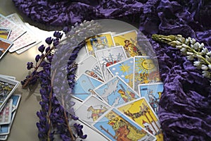 Romantic Tarot Setup Background. Tarot cards and Lupin flowers.