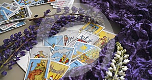 Romantic Tarot Setup Background. Tarot cards and Lupin flowers.