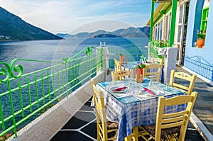Romantic terrace in cozy Greek restaurant. sea view