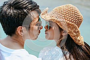 Romantic time loving couple kissing on the beach. Love travel concept