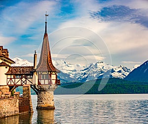 Romantic tower of amazing Oberhofen castle on Lake Thun, Switzerland