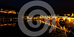 Romantic town of Heidelberg with castle and old bridge at night, Baden-Württemberg, Germany.