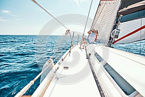 Romantic vacation. Young couple enjoying view on cruise ship deck