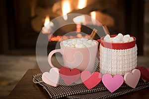 Romantic Valentine`s Day, Warm Fireplace Scene with Red and Pink Cocoa Mugs and Wood Hearts Garland in Cozy Living room with space