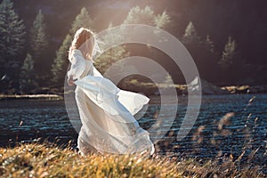 Romantic vintage woman in sunset light