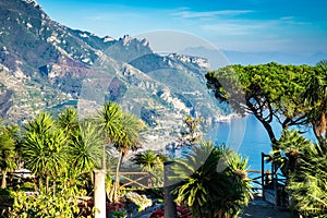 Romantic walkway and ornamental garden with colorful flowers, Villa Rufolo, Ravello, Amalfi coast, Italy