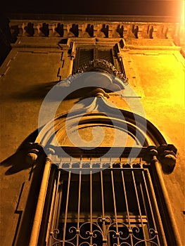 Romantic wall, windows, light, esoterism and magic in Turin city, Italy. photo