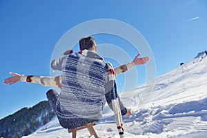 Romantic winter scene, happy young couple having fun on fresh show on winter vacatio, mountain nature landscape