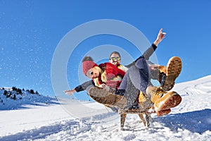 Romantic winter scene, happy young couple having fun on fresh show on winter vacatio, mountain nature landscape