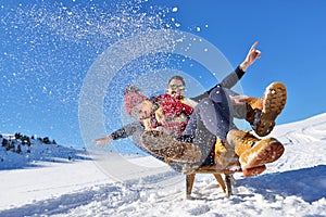 Romantic winter scene, happy young couple having fun on fresh show on winter vacatio, mountain nature landscape