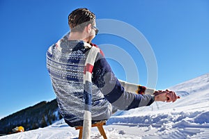 Romantic winter scene, happy young couple having fun on fresh show on winter vacatio, mountain nature landscape