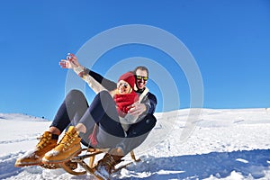 Romantic winter scene, happy young couple having fun on fresh show on winter vacatio, mountain nature landscape