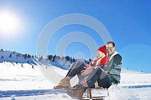 Romantic winter scene, happy young couple having fun on fresh show on winter vacatio, mountain nature landscape