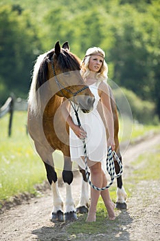 Romantic woman with horse