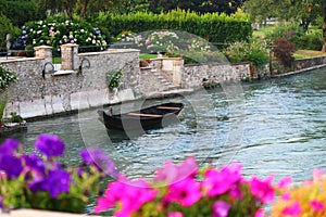 Romantic wooden boat in a river