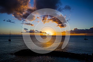 Romantic yellow sunset on a beach of Martinique