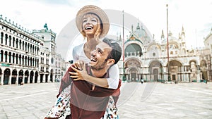 Romantic young couple enjoying vacation in Venice, Italy - Happy tourists visiting Italian city on summer holiday