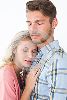 Romantic young couple with eyes closed
