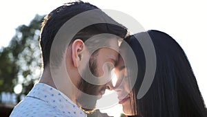 Romantic young couple love time with beautiful sunlight, flare. Love, valentines and holiday concept. Romantic date and