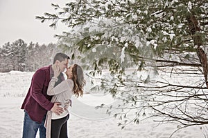 Romantic young couple outdoors in winter