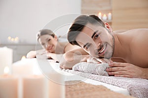 Romantic young couple relaxing in spa