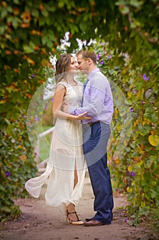 Romantic young couple together in the park