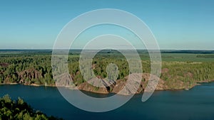 Romantsevo hills and lakes in Tula oblast drone aerial zoom out