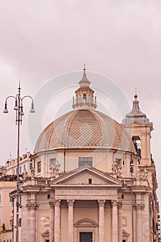 Rome church Santa Maria dei Miracoli - one of the twin churches on Piazza del Popolo, Italy