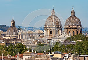 Rome cityscape with church domes seen from Aventine hill, Italy