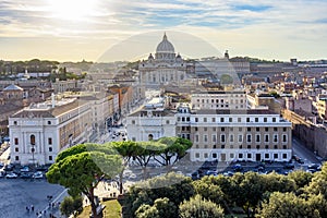 Rome cityscape with St. Peter`s basilica in Vatican at sunset, Italy translation