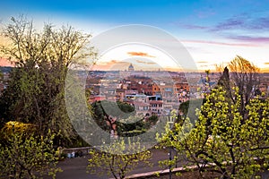 Rome. Colorful dusk view of Rome and Vatican rooftops and landmarks