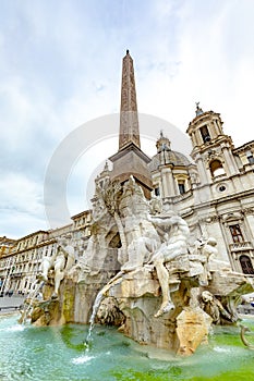 Rome, details of the Fountain of Neptune located at the north end of the Piazza Navona - a sea horse with cupids and other