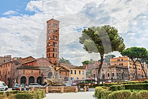 Rome. Fountain of Tritons (by Carlo F. Bizzaccheri ) and Basilica of Saint Mary in Cosmedin