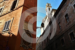 Rome historic centre: papal inscription and icon