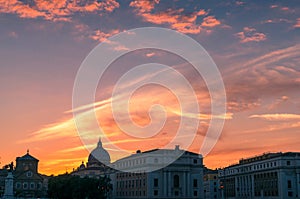 Rome historic city centre view at sunset with St Peters Basilica dome
