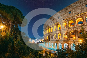 Rome, Italy. Amazing Bold Bright Dark Blue Night Starry Sky With Glowing Stars Above Colosseum Also Known As Flavian