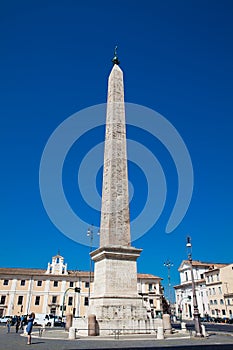 Tourists visiting the Lateran Obelisk an ancient Egyptian obelisk built on the 15th century B.C now