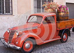 Vintage car parked in the street in Rome, Italy, Europe